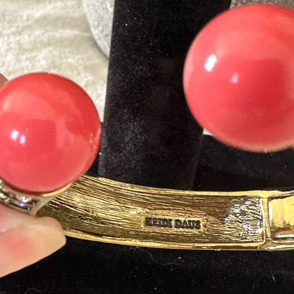 Heidi Daus Coral and Turquoise Hinged Bangle on a Gold toned Backdrop - Picture 8 of 9